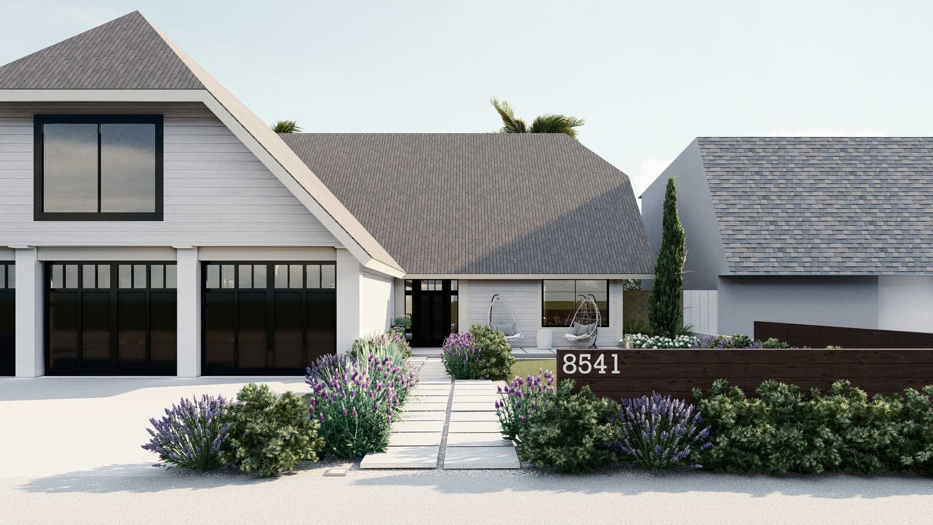 Front yard with lush plantings and concrete paver walkway