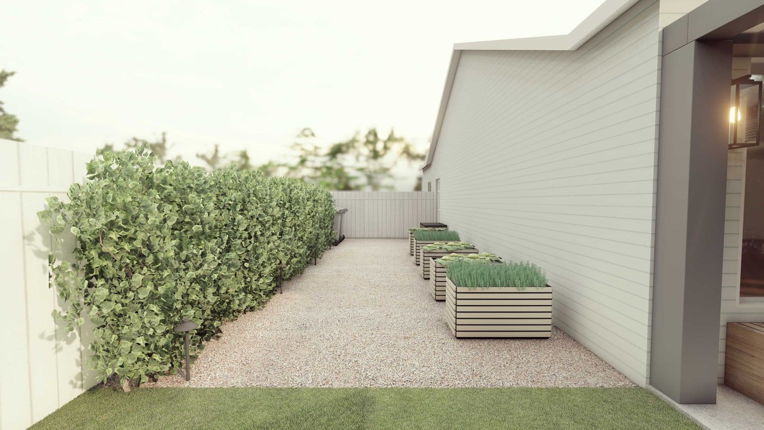 Twin Falls side yard with decorative fence and box planters on gravel flooring